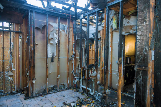 Professional Fire Damage Restoration technician working in Tano Road, NM